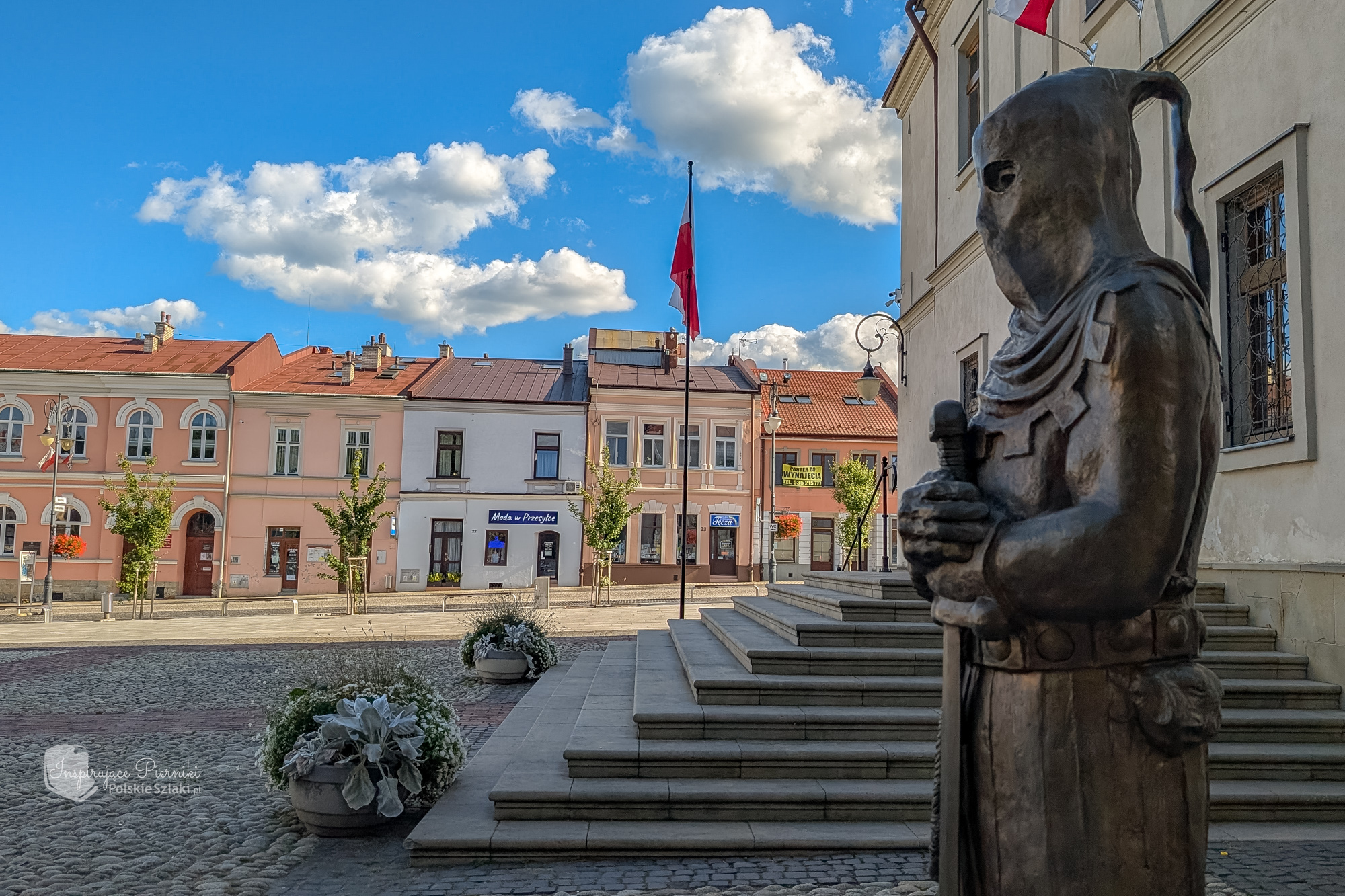 Biecz Main square with the beheader monument